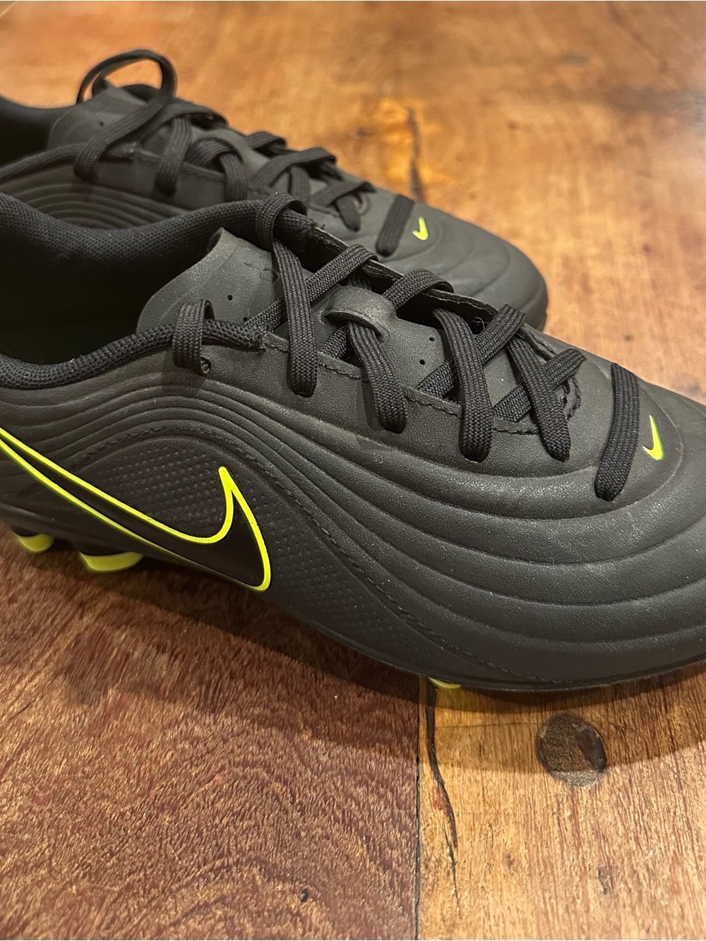 Kids Size 2.5 Nike Tiempo Black Soccer Cleats with Neon Yellow Swoosh